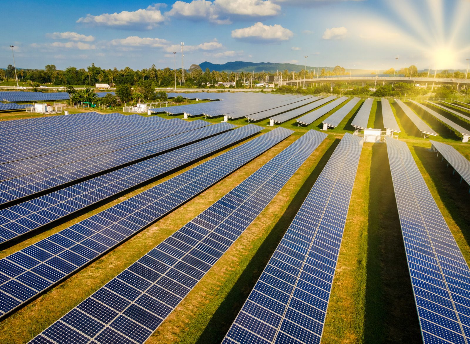 Sun power solar panel field in Thailand in the evening light during sunset. Sun energy green energy transition in Thailand
